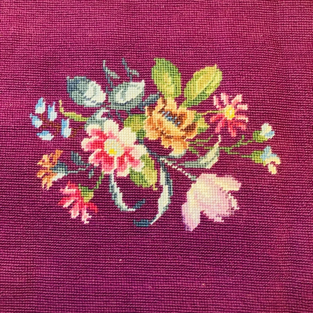 Beautiful vintage finished embroidery on burgundy wool, in fanciful floral’s